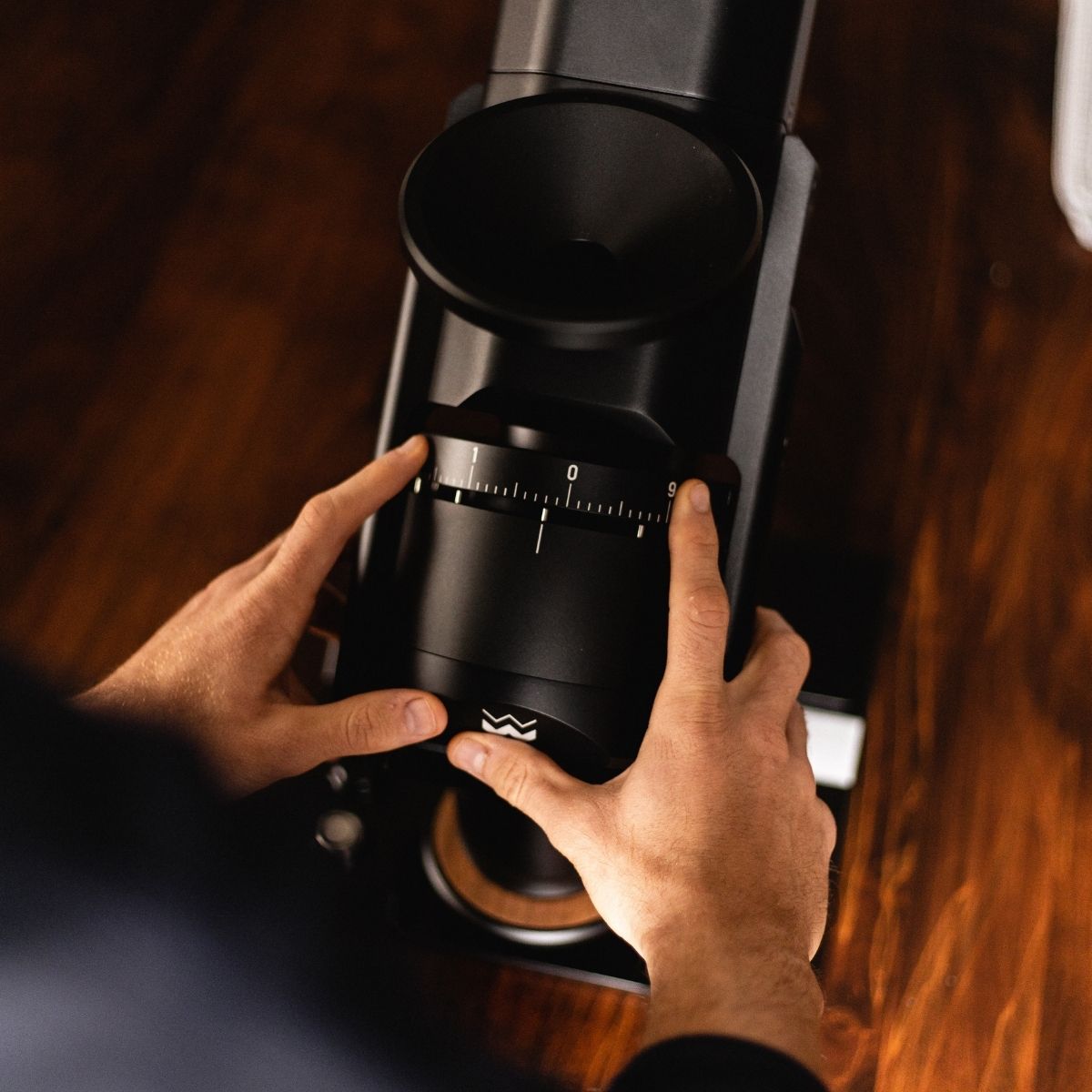 Adjusting grind size on Weber Workshops EG-1 Specialty Coffee grinder.