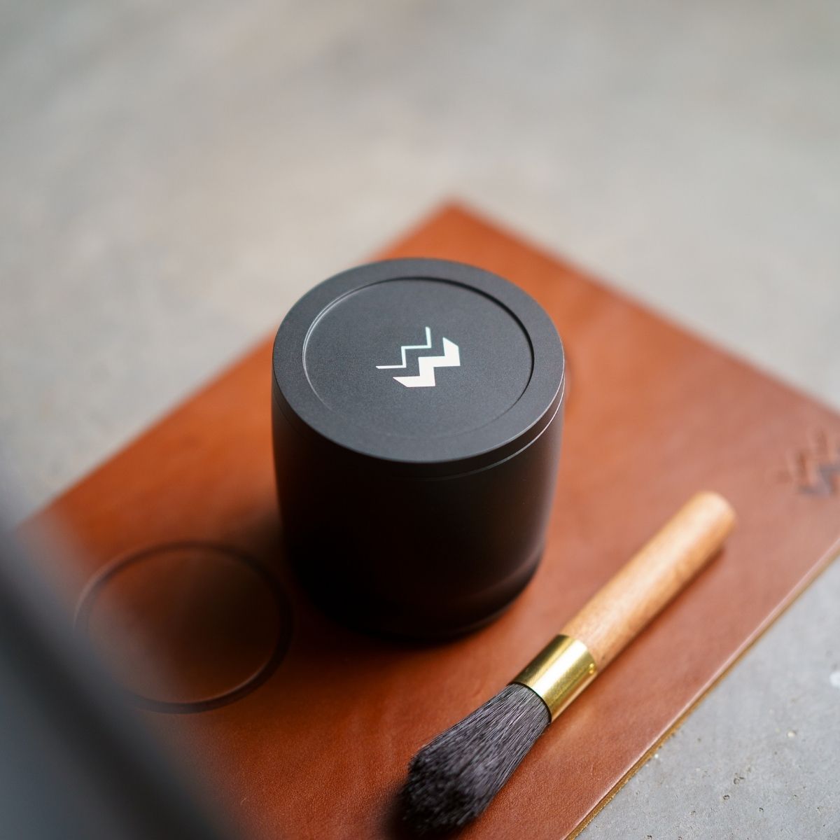 Blind Shaker Weber Workshops Distribution Tool with brush on leather surface